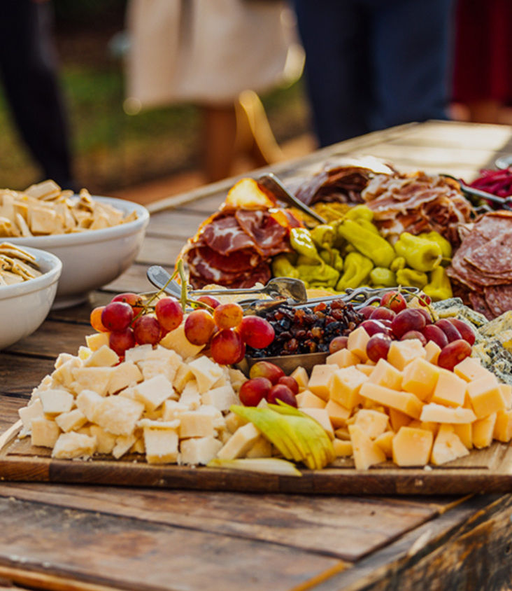Liquid Assets Charcuterie Board with cheese and fruit